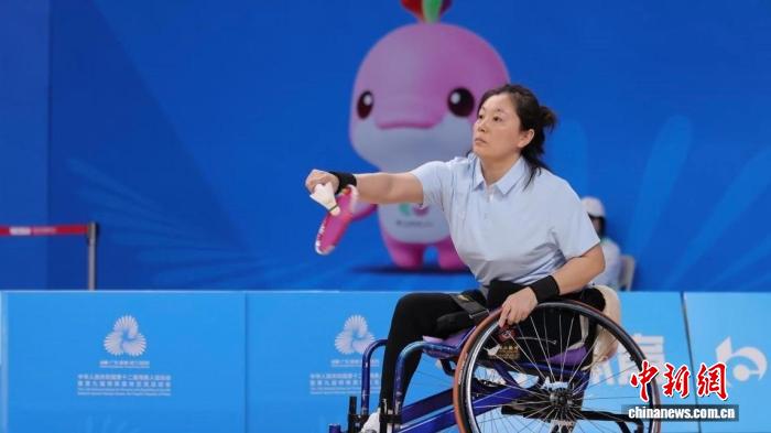 轮椅羽球冠军周俊青陈满塘续写传奇